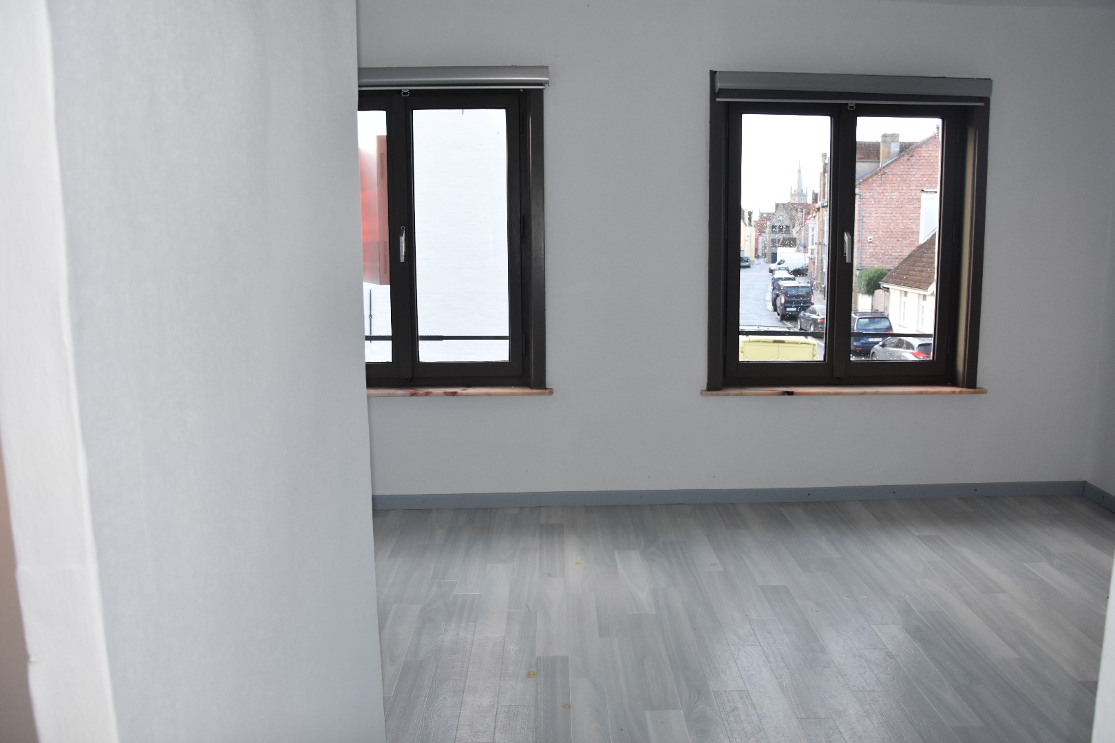 Opgefriste rijwoning met stadskoertje 