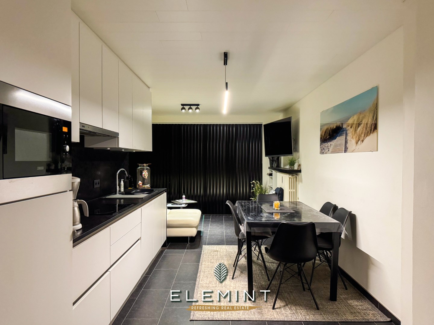 Gerenoveerd gelijkvloers appartement op 50 meter van het strand 