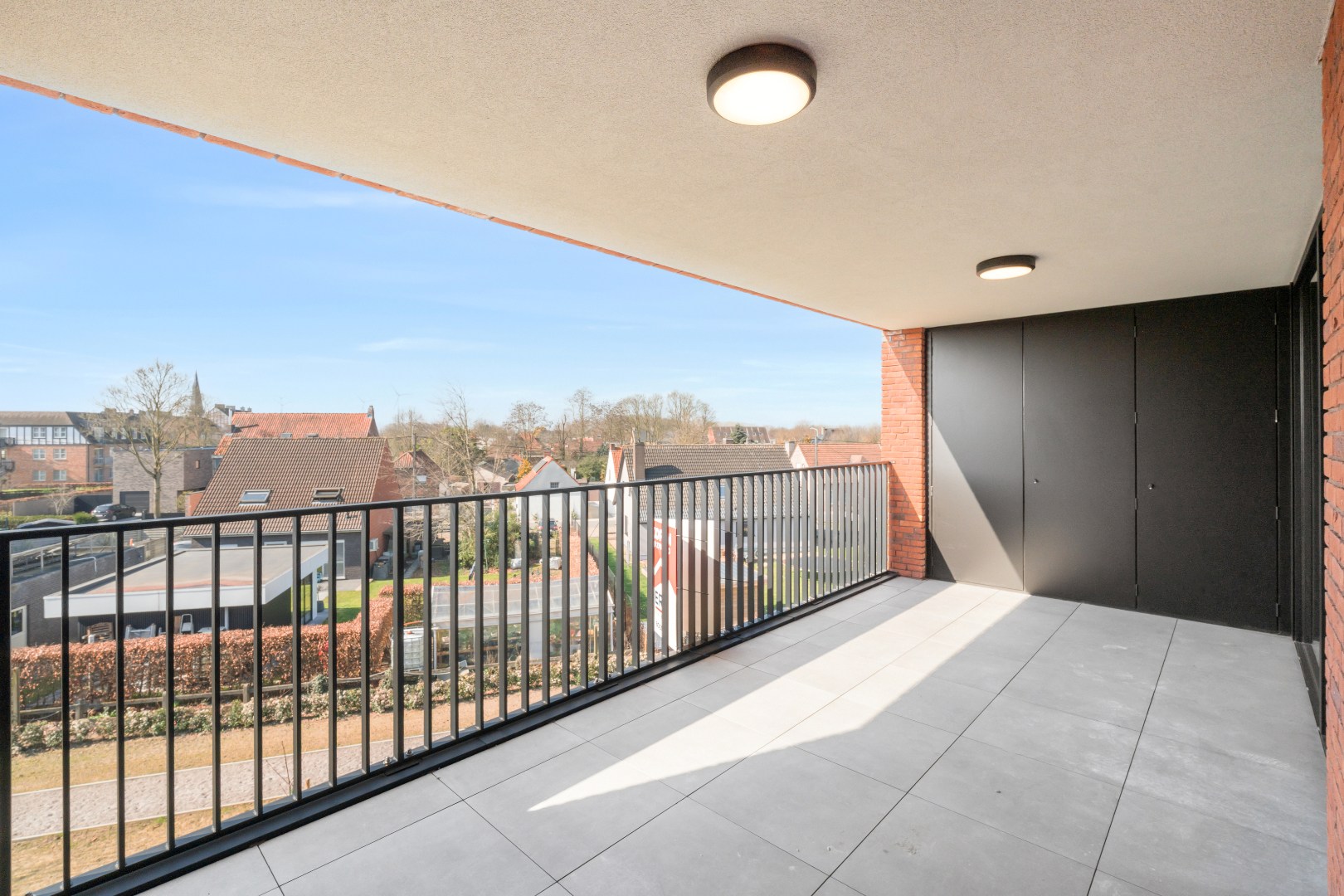 Nieuwbouwappartement met twee slaapkamers, terras en ondergrondse autostaanplaats te koop in Zulte 