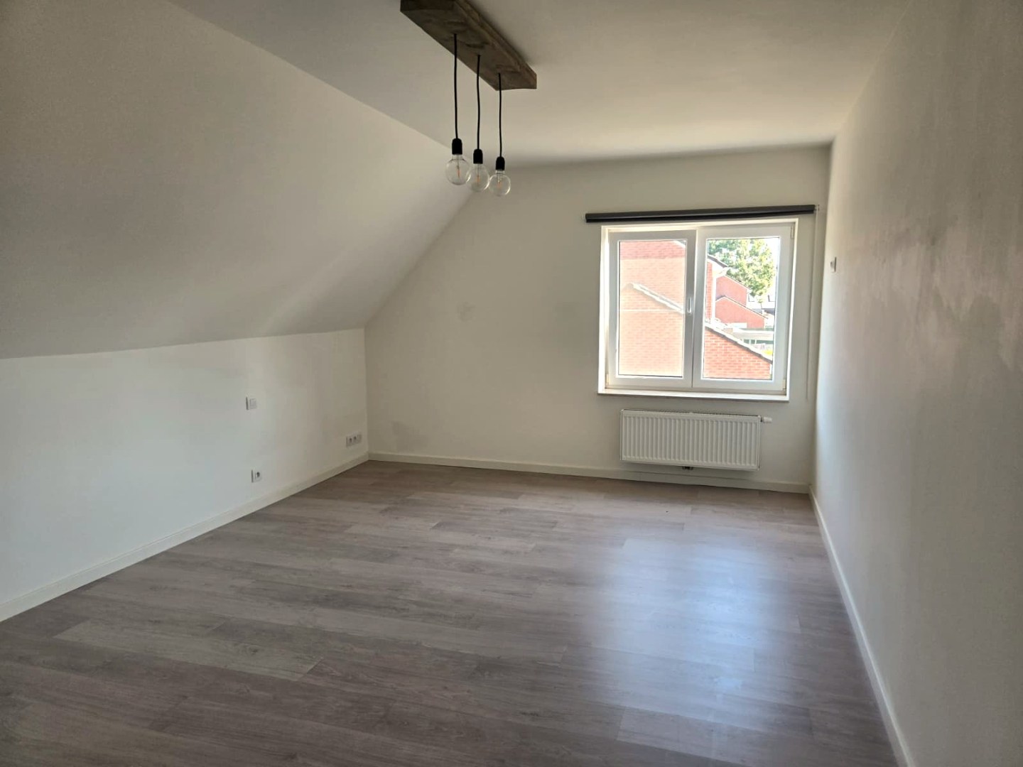 Energiezuinige halfopen woning met tuin en carport te Zulte 
