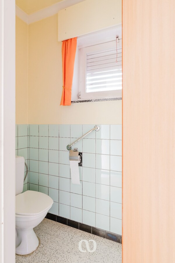 Stevige gezinswoning met tuin en volledige kelder in Lozer 