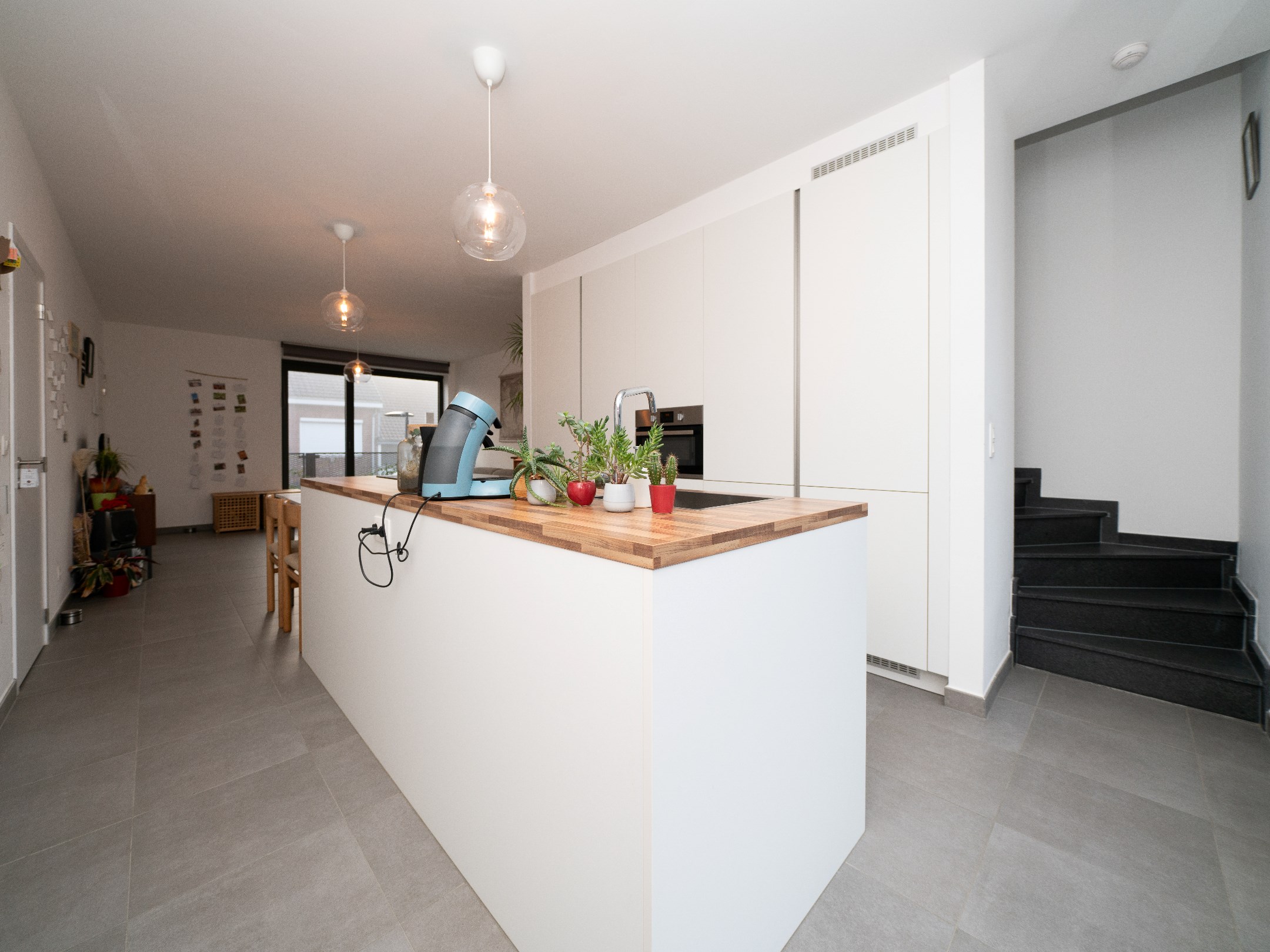 Nieuwbouwappartement met 3 terrassen, staanplaats en kelder 