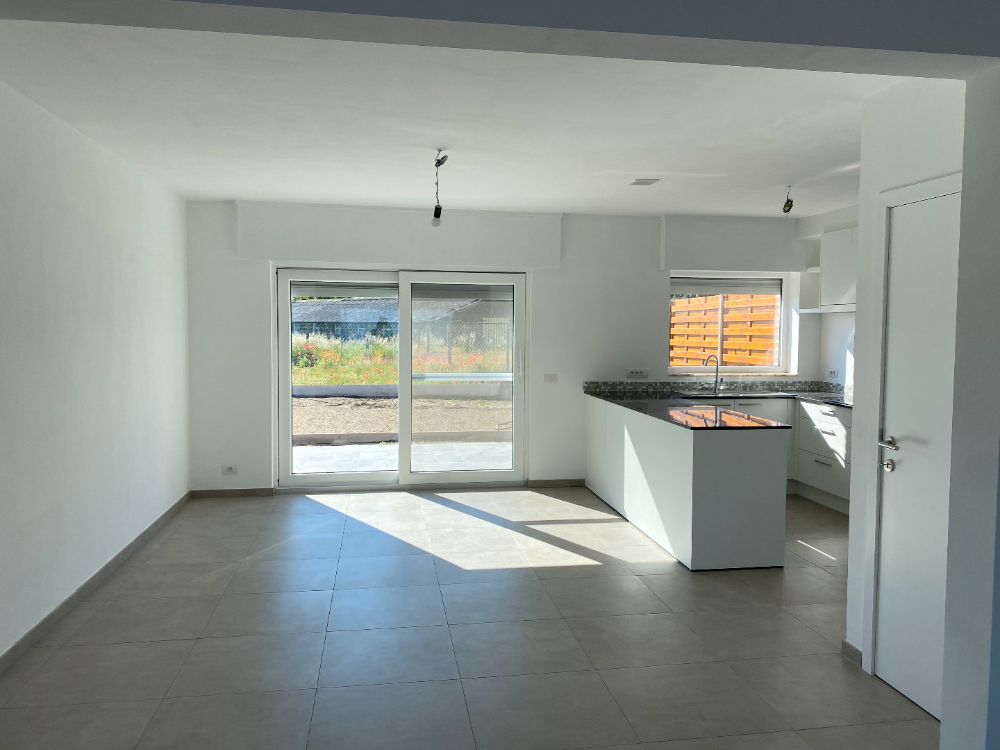 Energiezuinige halfopen woning met tuin en carport te Zulte 