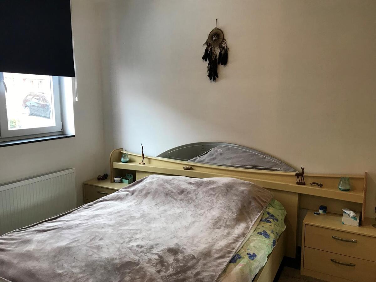 Gelijkvloersappartement met tuin en 2 autostaanplaatsen 