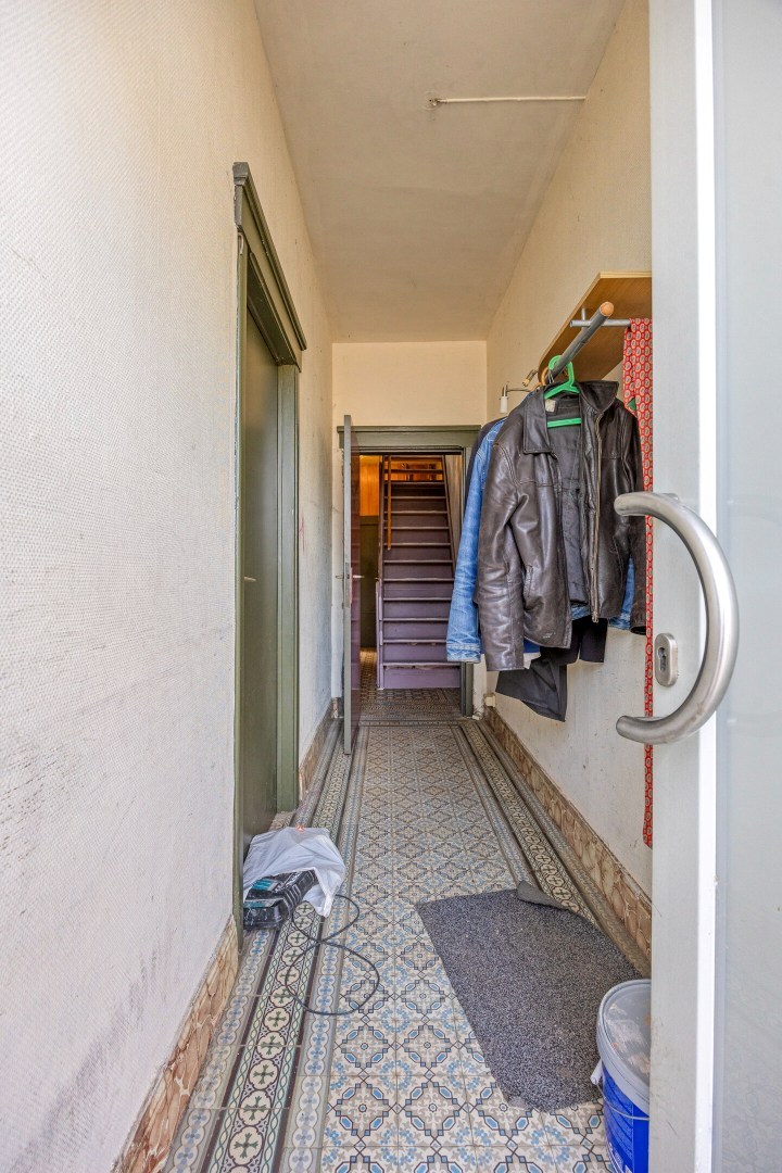 Halfopen bebouwing met 5 ruime slaapkamers, 2 badkamers, garage en tuin in Holsbeek – bewoonbare oppervlakte 214m² 