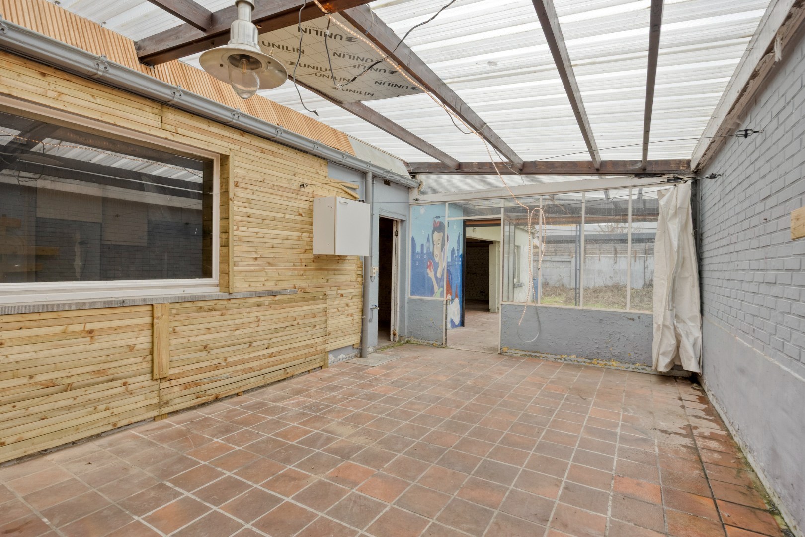 Te renoveren woning met 4 slpk. en gezellige stadstuin op een centrale ligging in Geel 