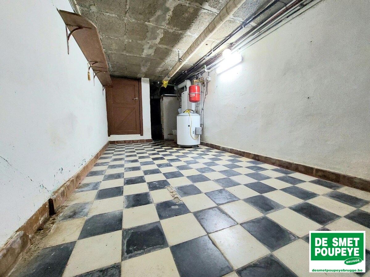 Gelijkvloersappartement met terras en garage 