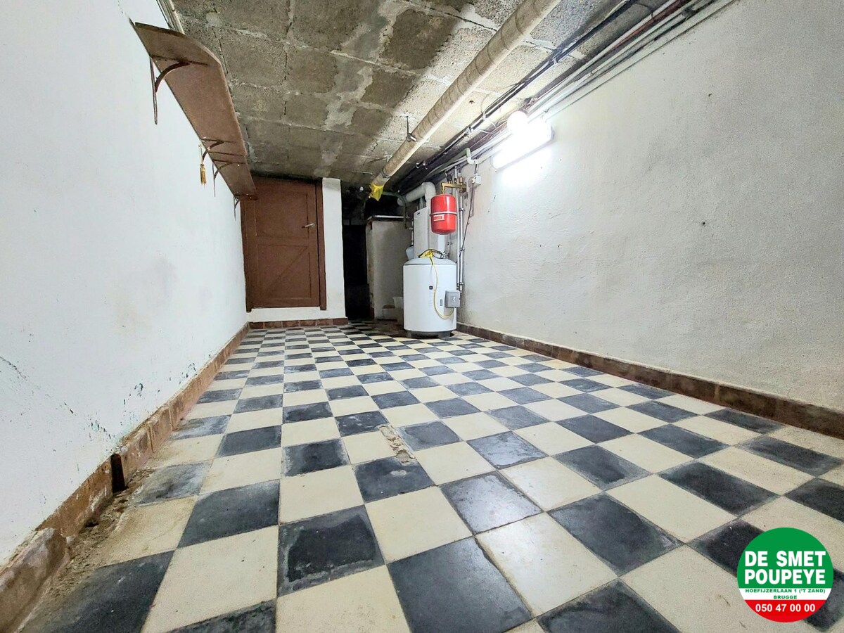 Gelijkvloersappartement met terras en garage 