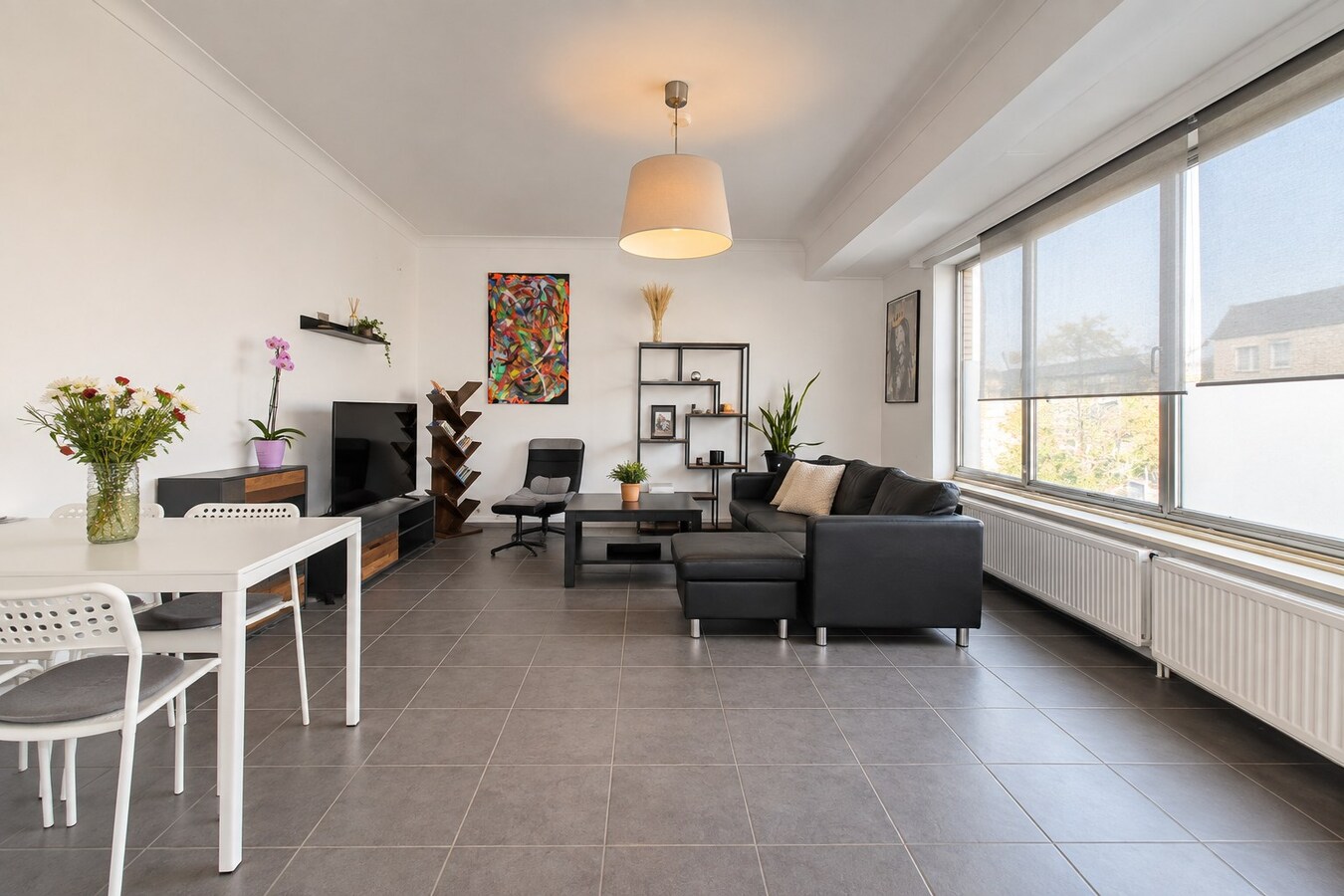 Te koop: Lichtrijk en instapklaar 2-slaapkamerappartement met terras en EPC-label C op gunstige ligging in Sint-Niklaas! 