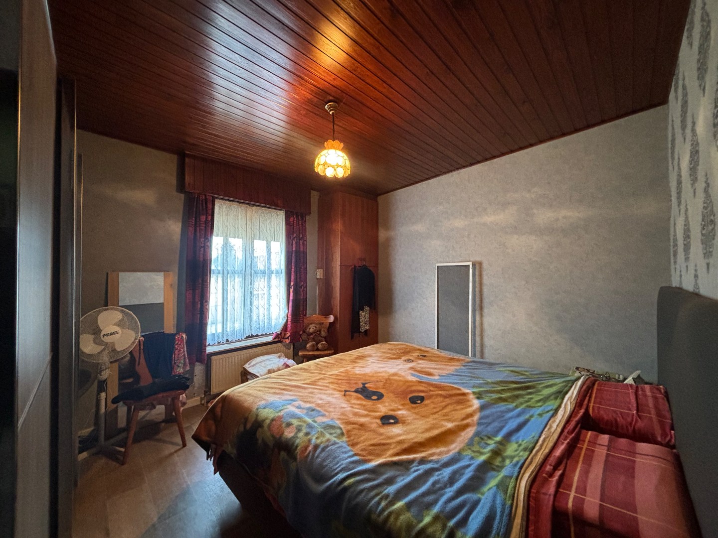 Gelijkvloerse woning met 2 slpk., garage en carport nabij centrum Mol 