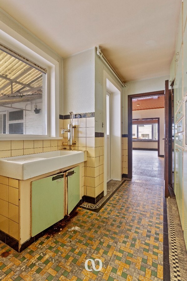 Te renoveren gezinswoning met mooie tuin in Oudenaarde 