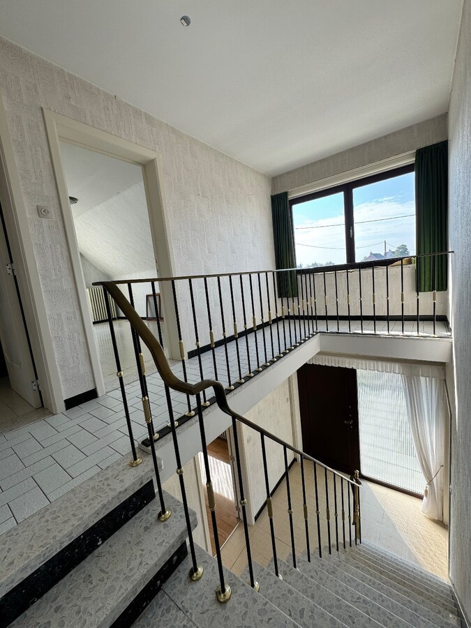 Alleenstaande woning met 4 slaapkamers en garage te Westende 