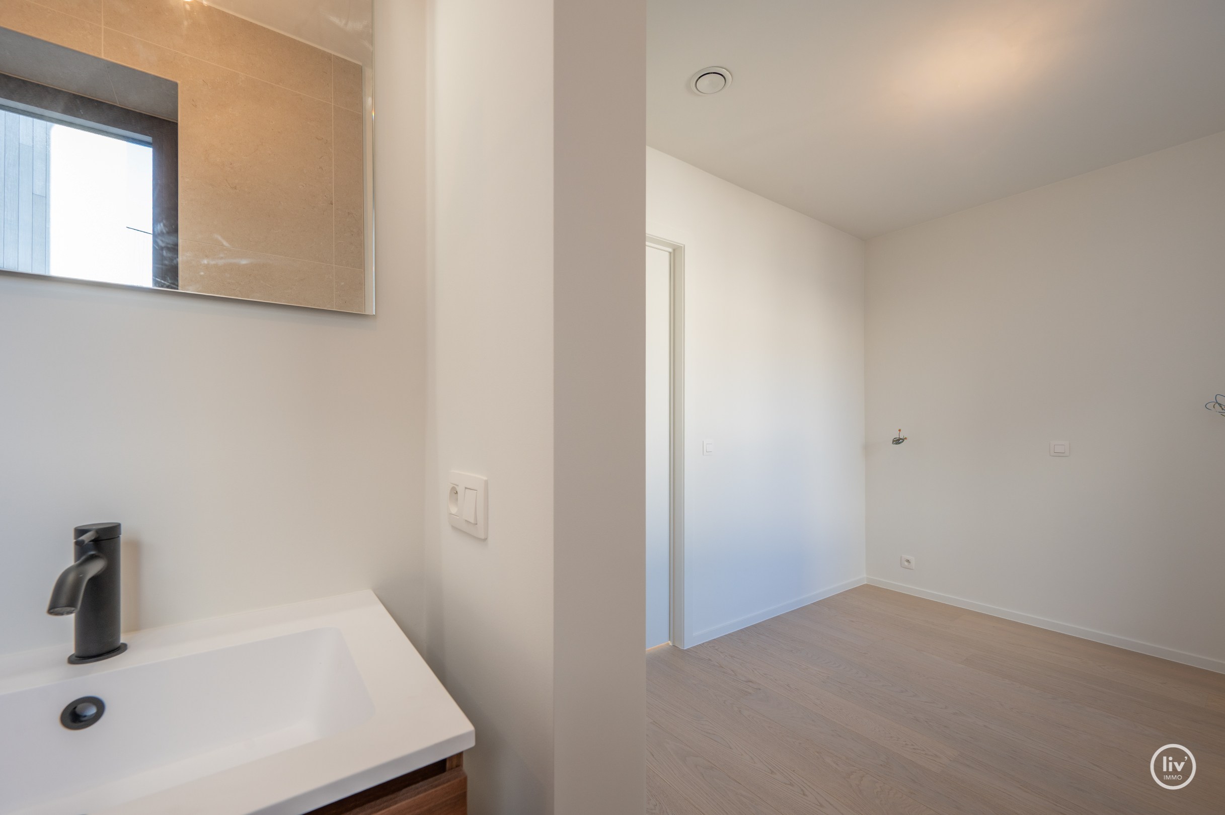 Centraal gelegen nieuwbouw-appartement in de residentie Maurice (met mogelijkheid tot aankoop van een inpandige autostaanplaats). 