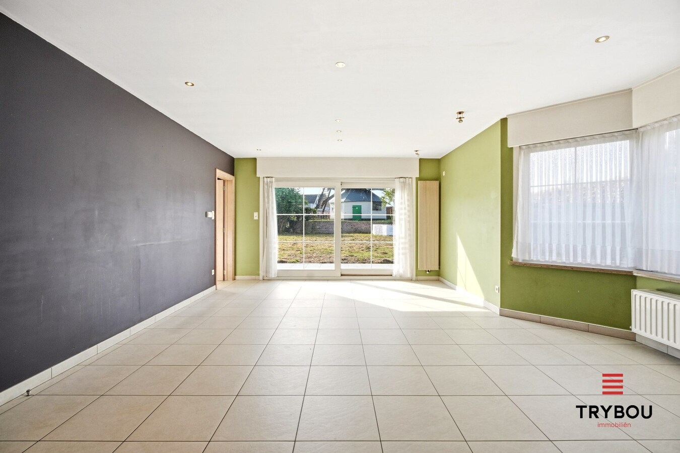 Ruime halfopen woning met 5 slaapkamers te koop in Werken met garage en ruime tuin! 