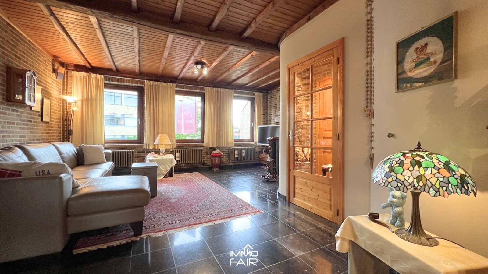 Stijlvol woon- en handelshuis met charmante stadstuin 