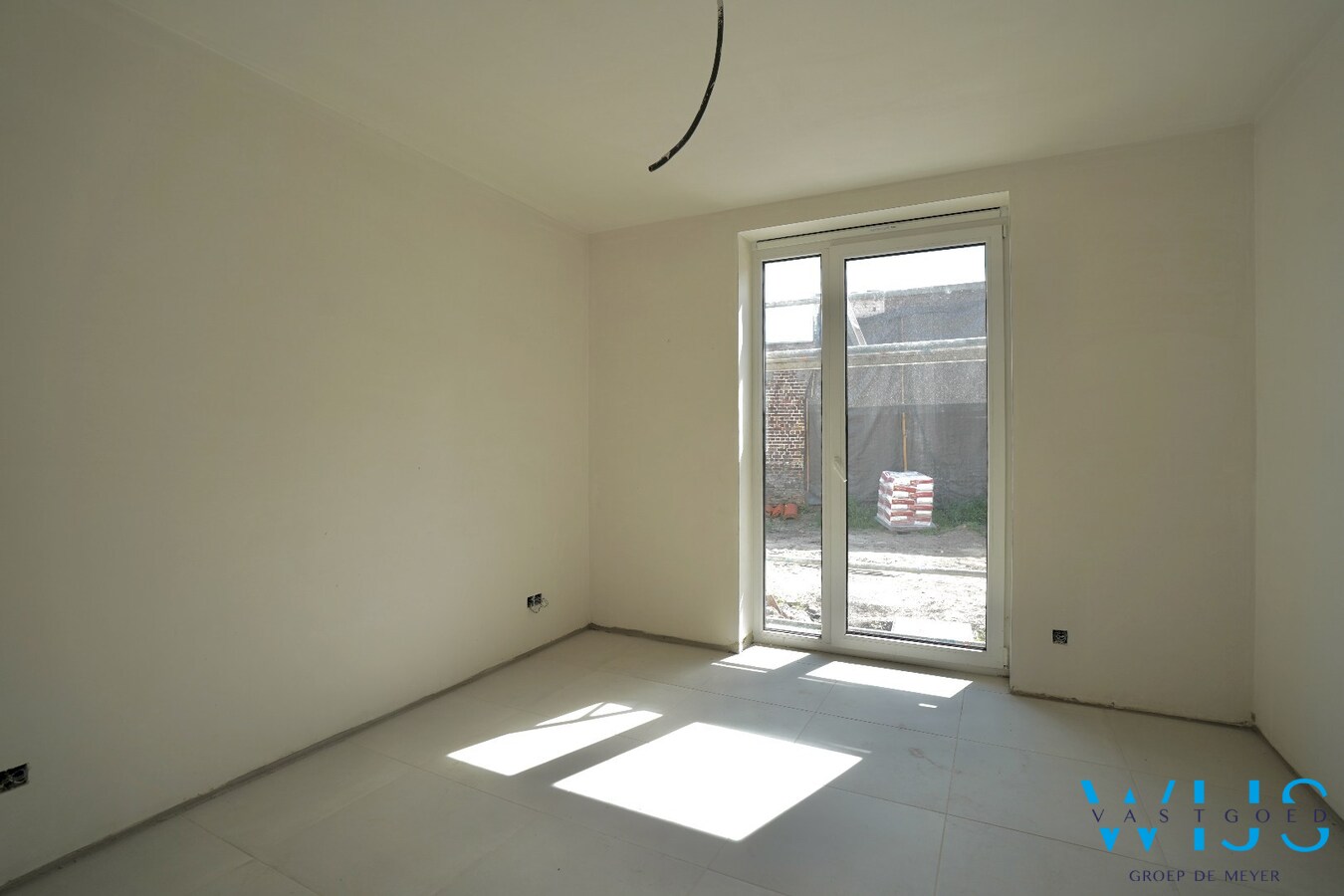 Gelijkvloers nieuwbouwappartement met private inkom en tuin 