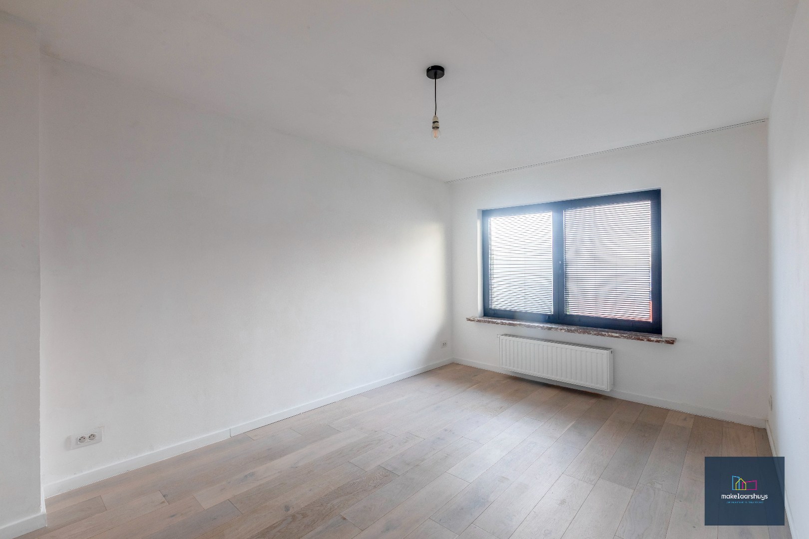 Instapklare eigendom met tuin te Mariakerke 