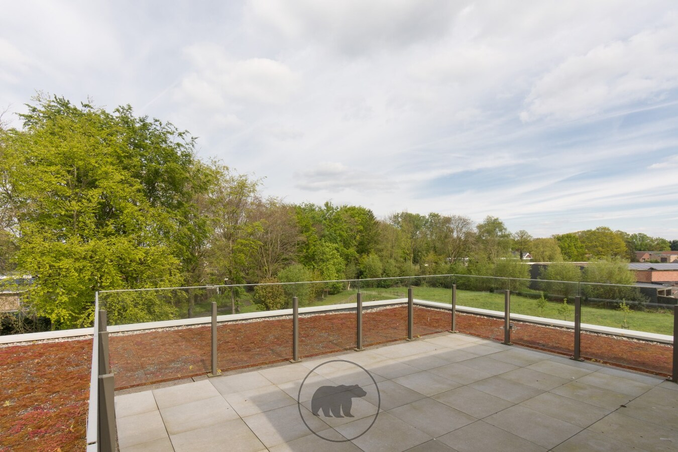 Luxueuze assistentiewoning met ruim terras en zicht op parkdreef 