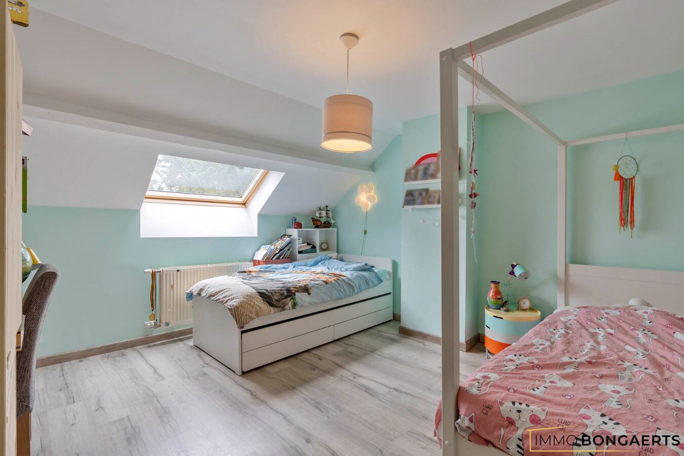 Karaktervolle woning met 4 slaapkamers, tuin en garage. 