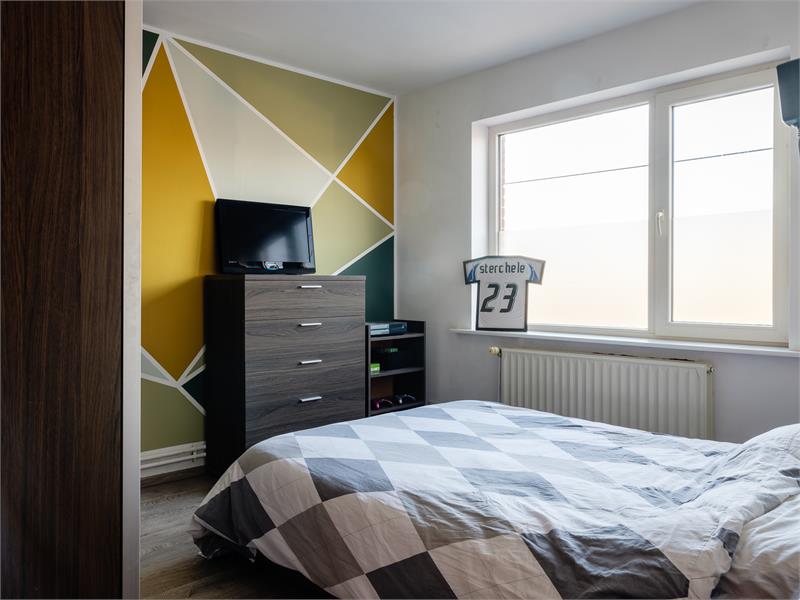 Instapklare, ruime half-open bebouwing in groene residentiële wijk te Evergem 