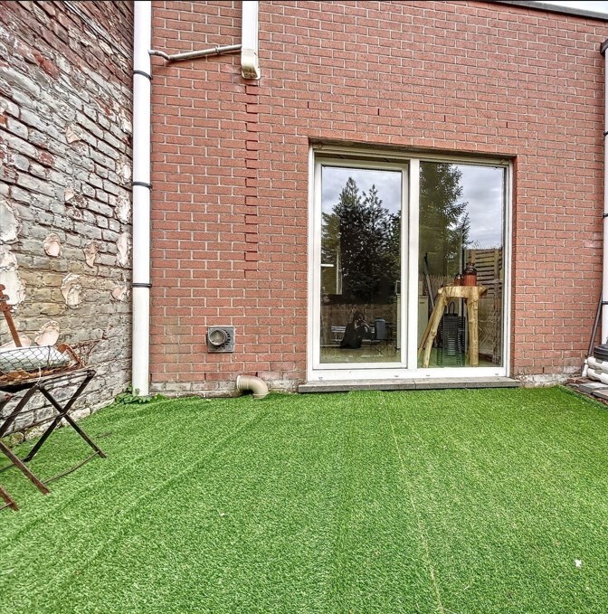Handelspand met woonst en tuin op zeer commerciële ligging! 