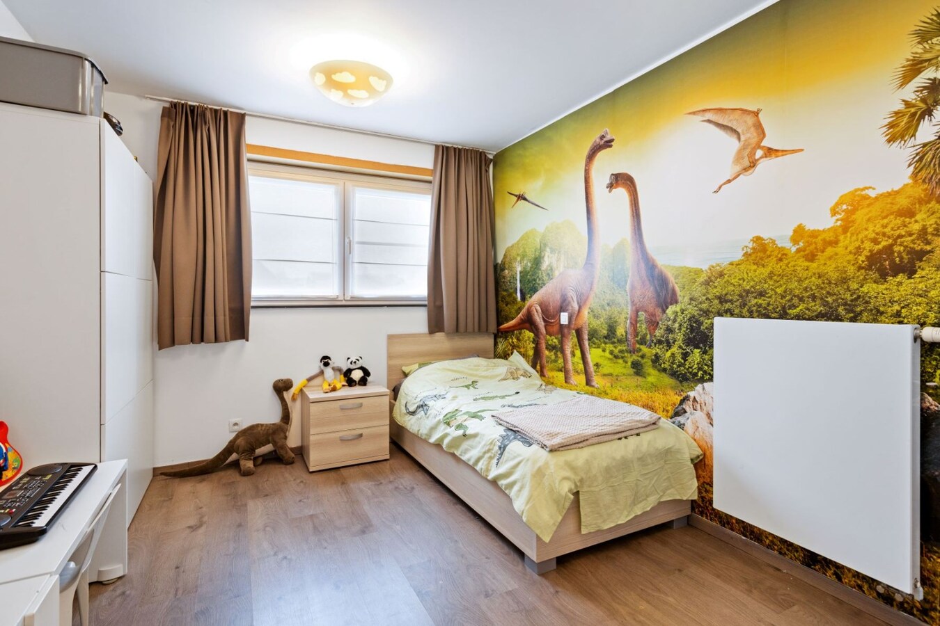 Centraal gelegen, halfopen woning met zonnige tuin 