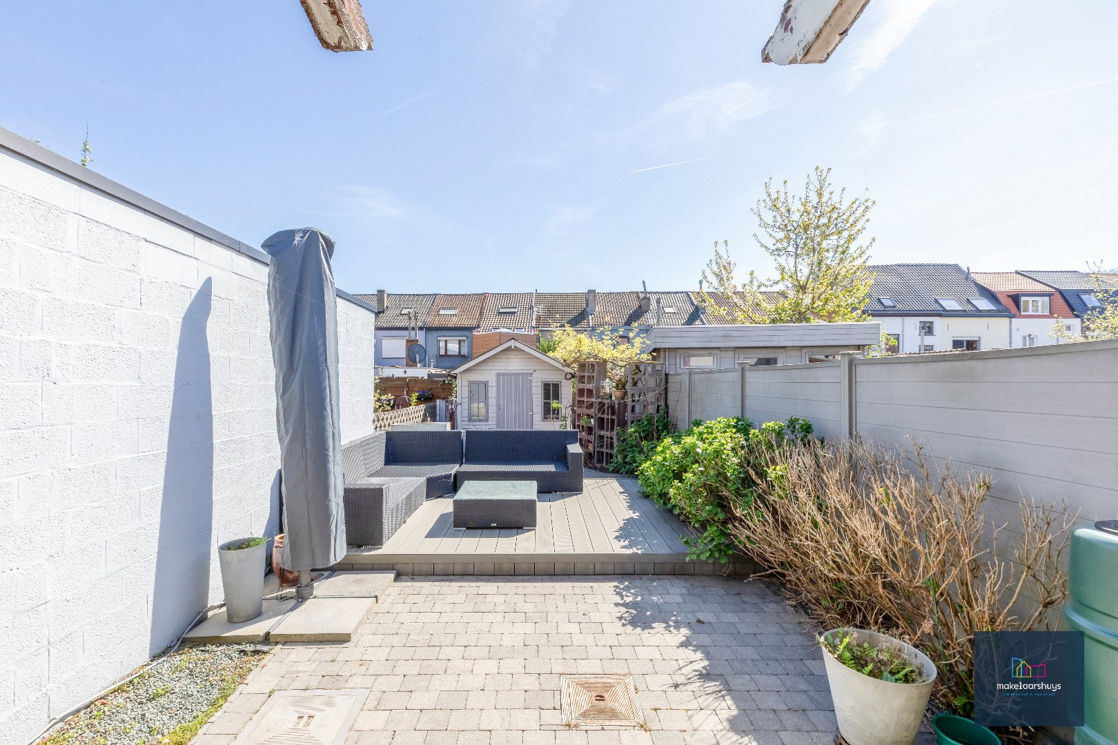 Goed onderhouden en ruime woning in rij met tuin/terras te Wondelgem 