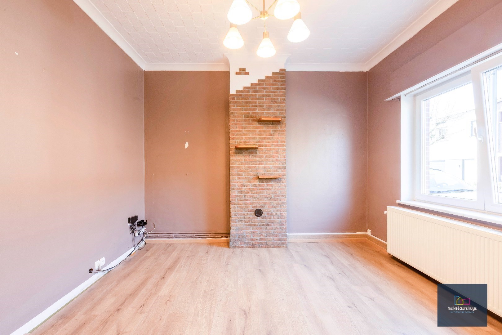 Goedgelegen woning met 2 slpk te Gent 