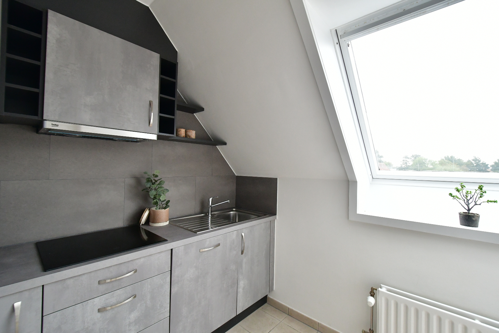 Ruim duplex app. met 3 slpks, terras &amp; garage te Adegem 