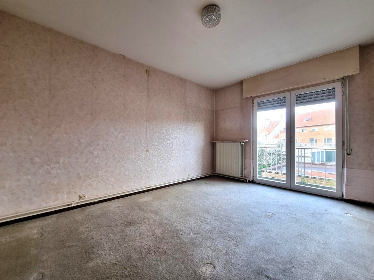 Uitzonderlijk ruim (129m²) en breed (+-10,45m) appartement met drie slaapkamers + mogelijkheid garage 