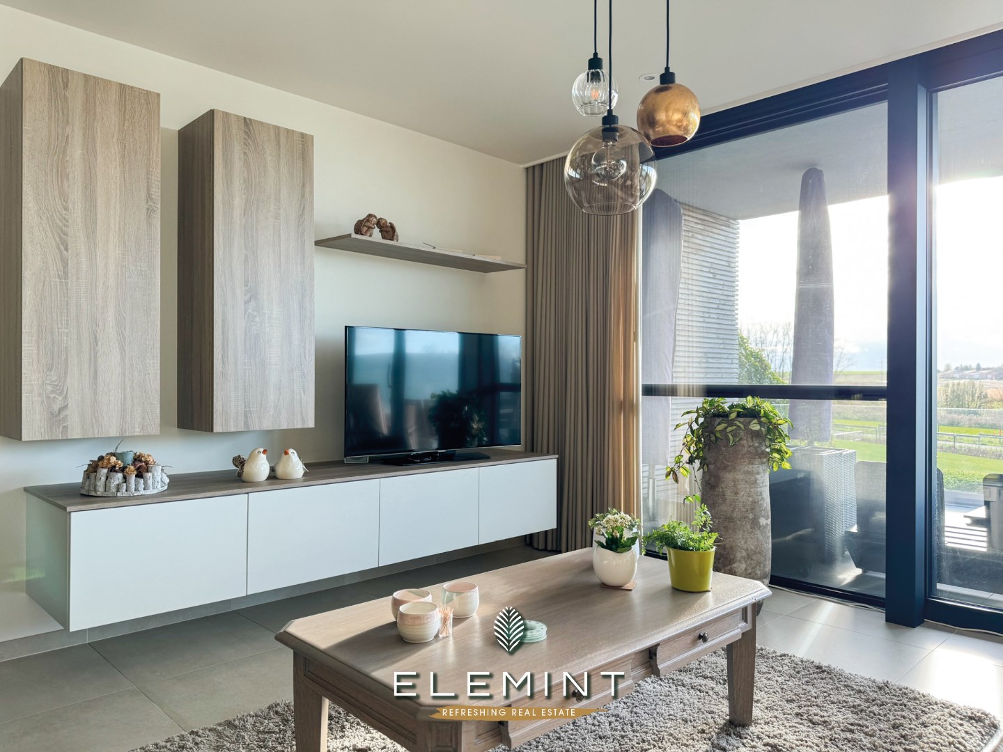 Ruim modern appartement met terras, 2 slaapkamers en 2 staanplaatsen 