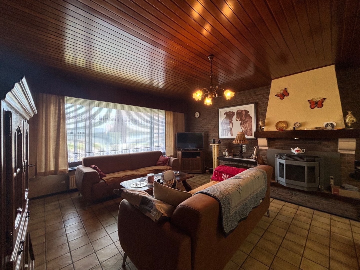 Gelijkvloerse woning met 2 slpk., garage en carport nabij centrum Mol 