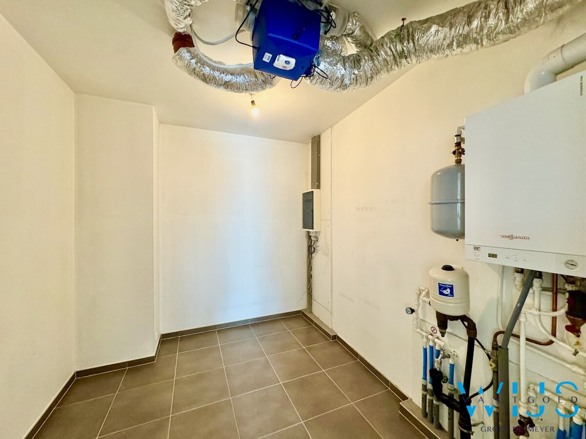 Gelijkvloersappartement met tuin en staanplaats te Ertvelde ! 