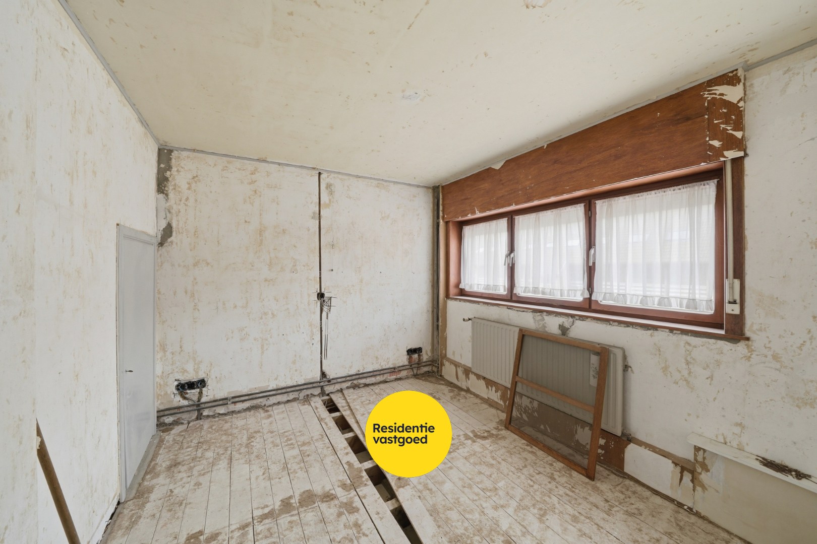 Te renoveren woning met garage en tuin in de Vuurtorenwijk te Oostende 