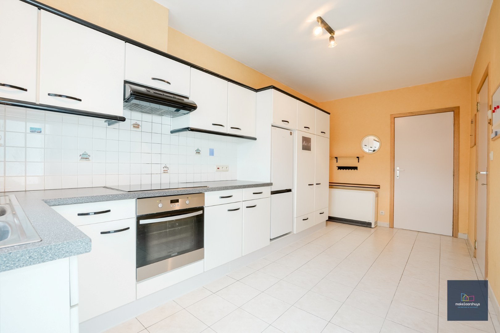 Verzorgde woning in rij met tuin en dubbele garage 