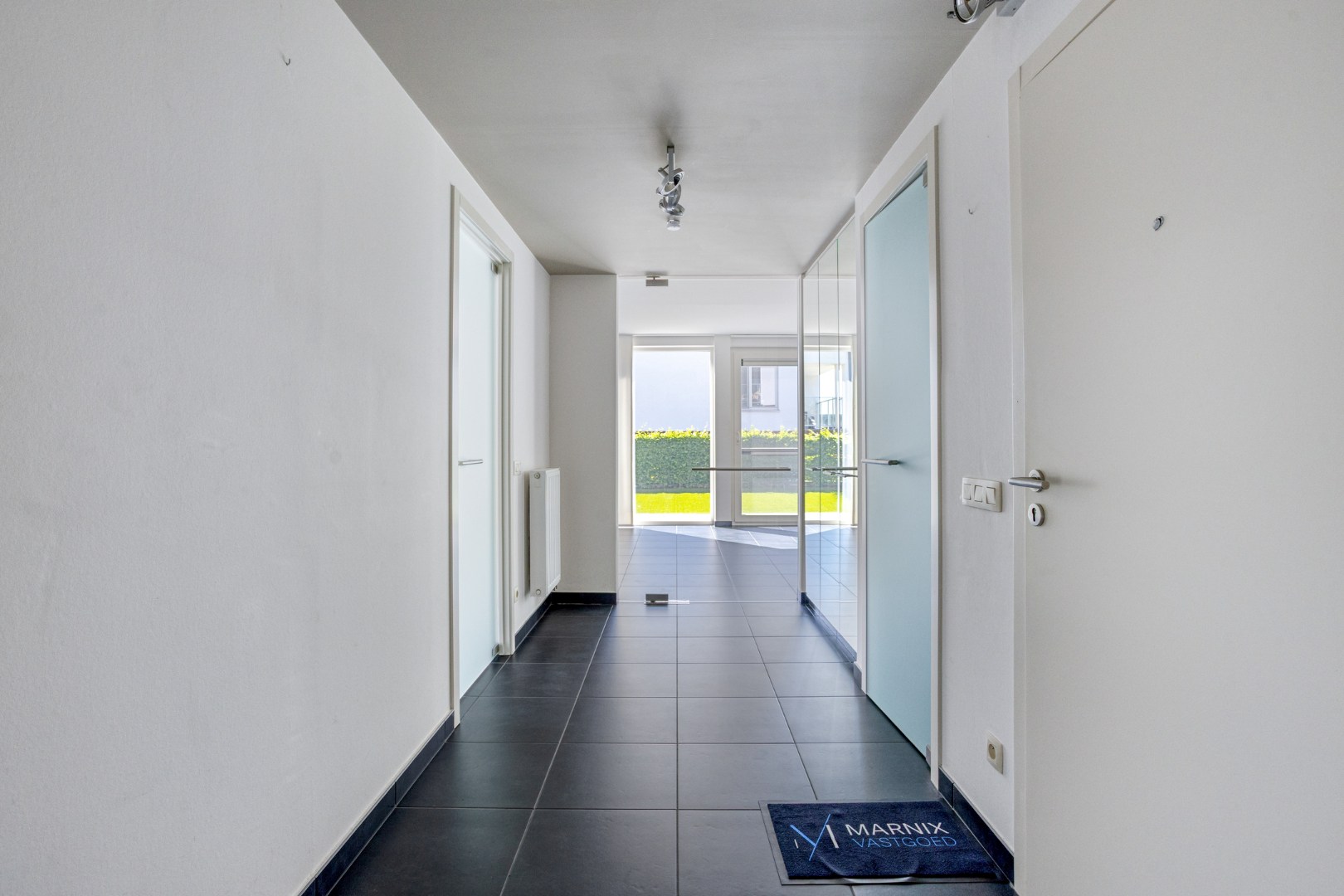 Instapklaar gelijkvloers appartement met groot terras, tuin en garagebox in Kumtich - EPC 104 KWH/m² 