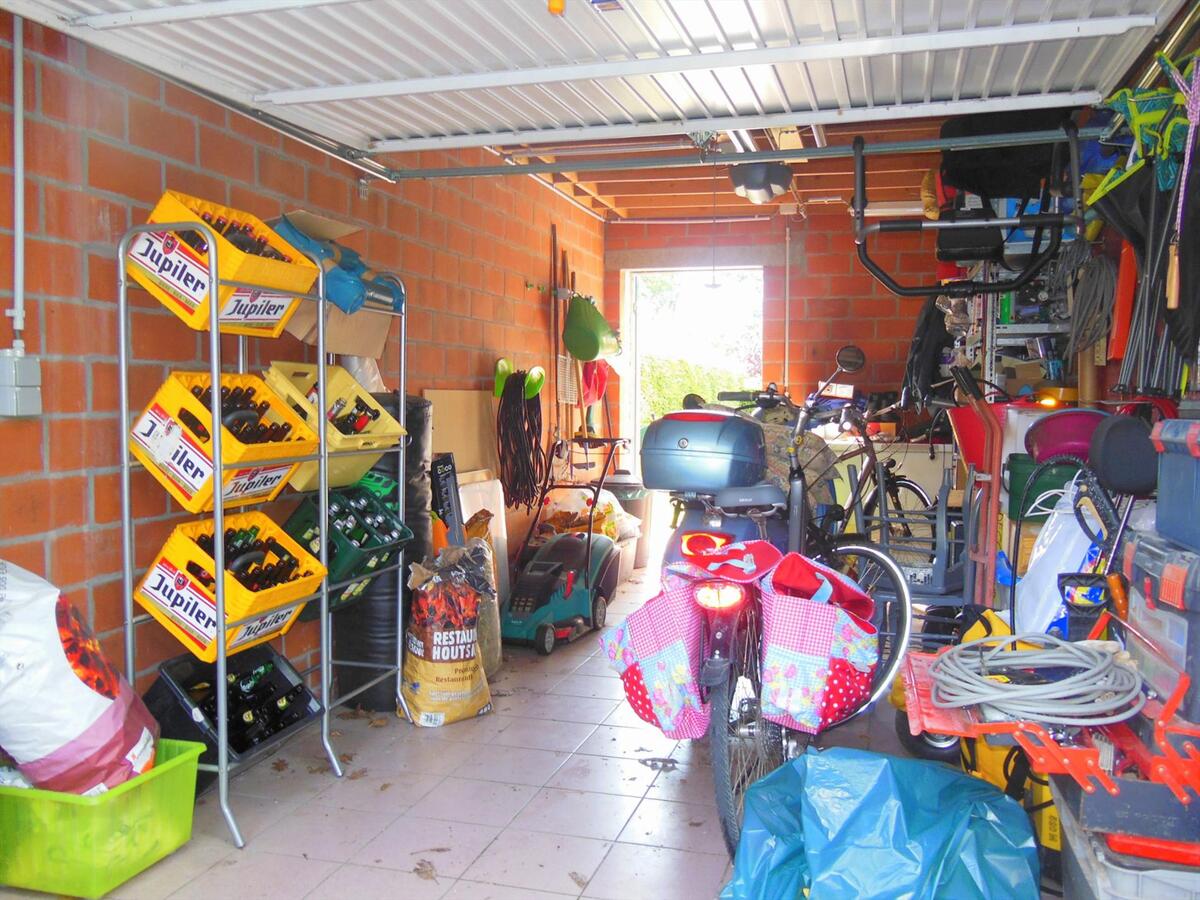 Gezellig gelijkvloersappartement met zonnige tuin en garage 