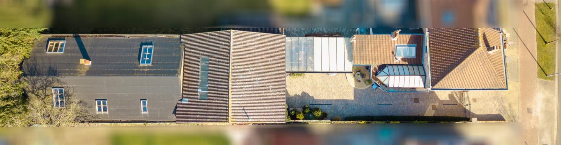 Uitzonderlijke woonst met werkplaats 