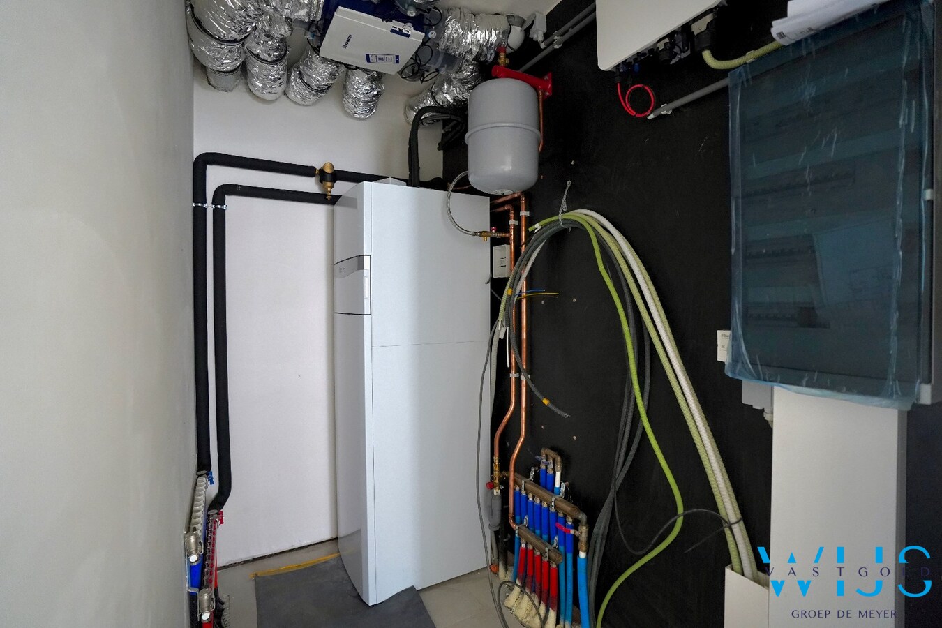 Ruim gelijkvloers nieuwbouwappartement met tuin en 2 terrassen 