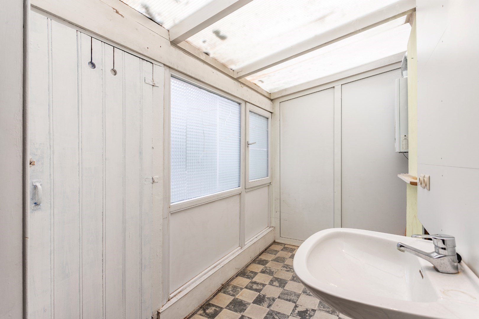 Handelshuis én appartement centrum Halle 