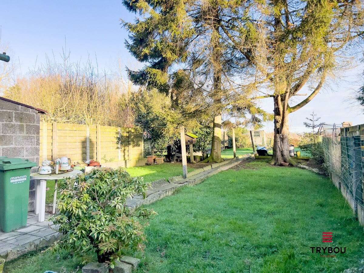 Ruime gezinswoning met 4 slaapkamers, garage en tuin 