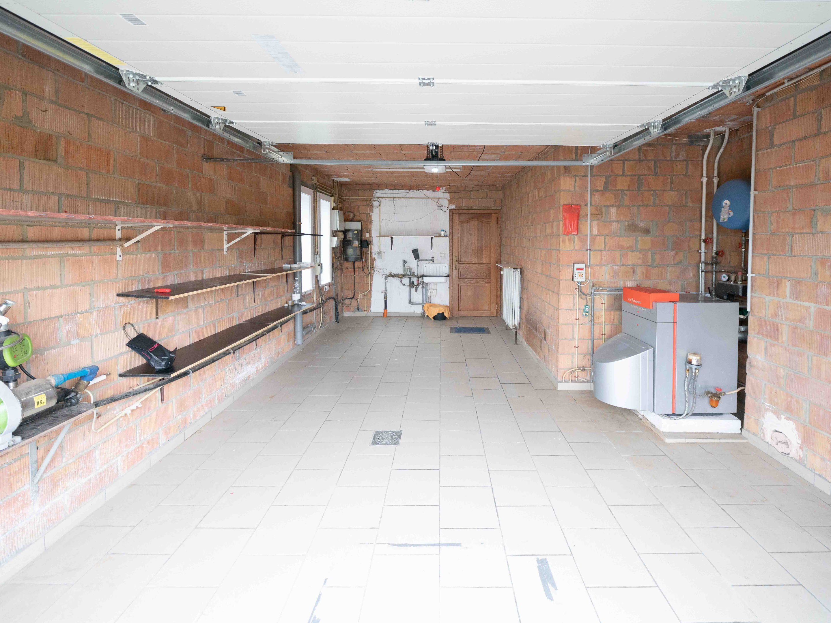 Energiezuinige woning met 4 kamers, 2 badkamers &amp; 2 garages 