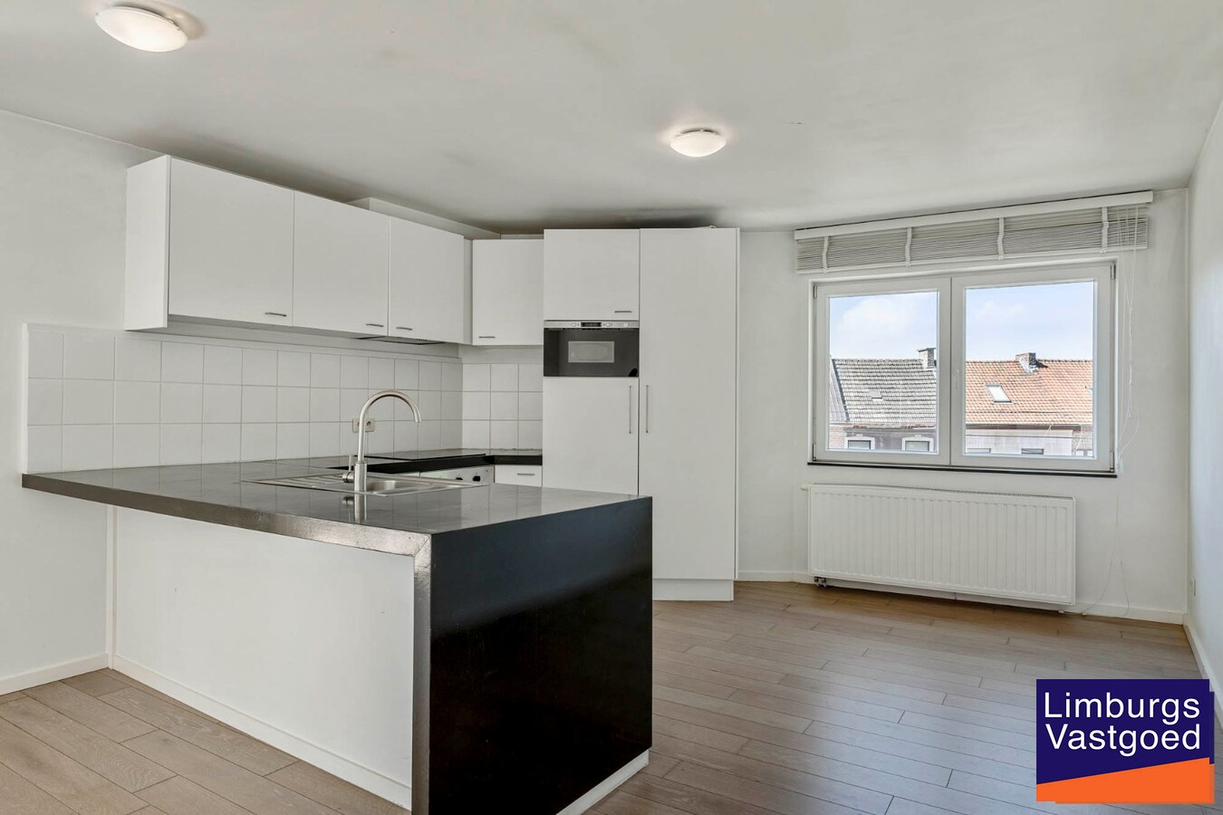 Ruim appartement (125m²) met 2 slpk en terras aan de kleine ring 