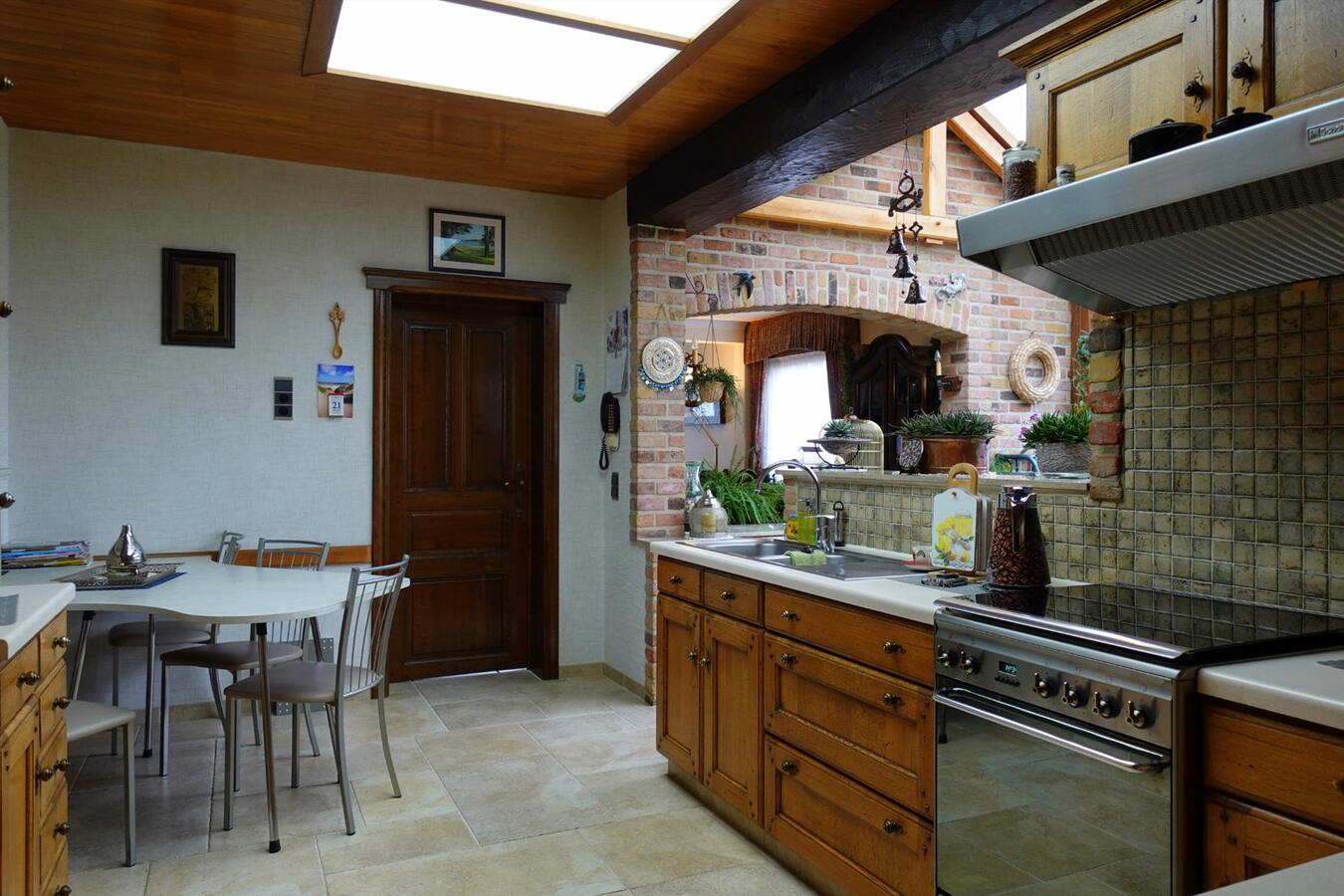 Uitzonderlijke woonst met werkplaats 