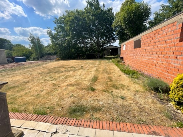 Gelijkvloers appartement met 2 slaapkamers en ruime tuin! 