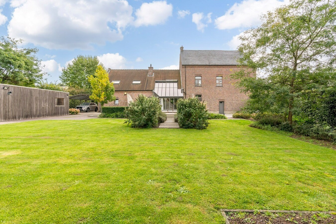 Luxe herenhuis met praktijkruimte in Niel-bij-As 