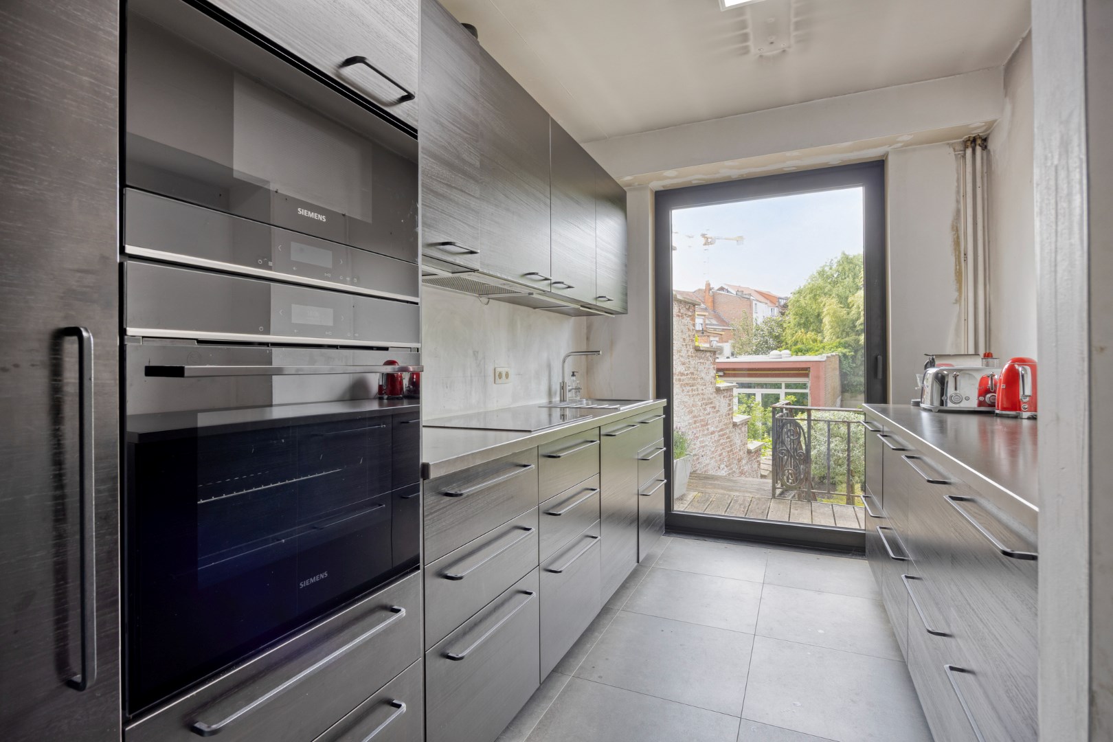 Prachtig herenhuis op de Tiensevest met mogelijkheid tot praktijkruimte - bewoonbare opp. 555 m² 