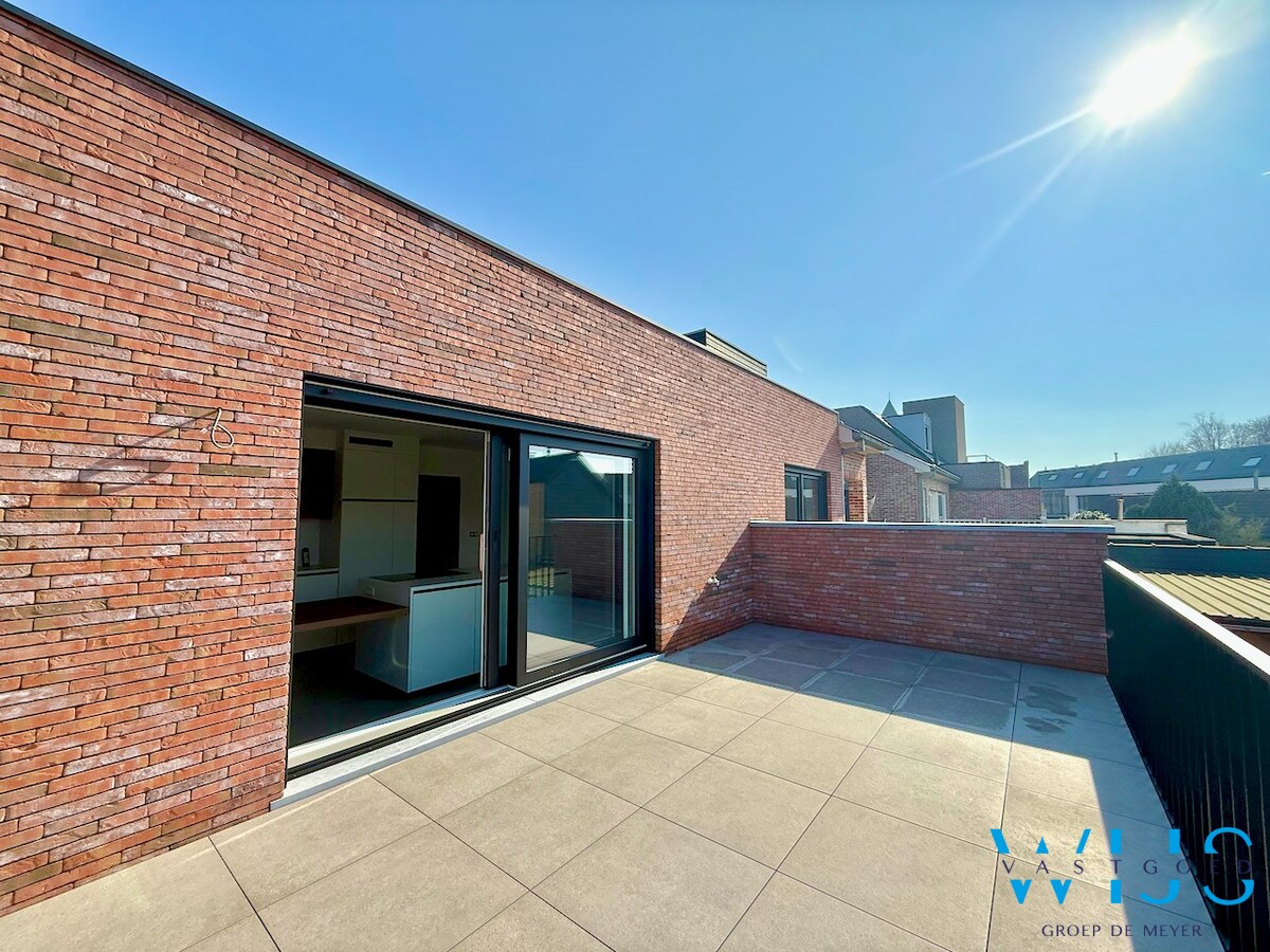 Drieslaapkamer appartement met garage in hartje Ertvelde ! 