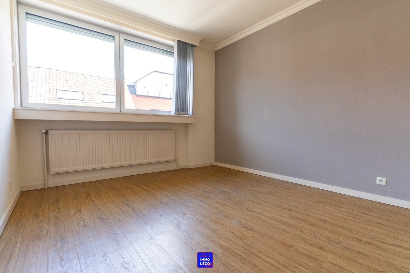 Maison "Bel-Etage" avec double garage, jardin, en plein centre-ville ! 