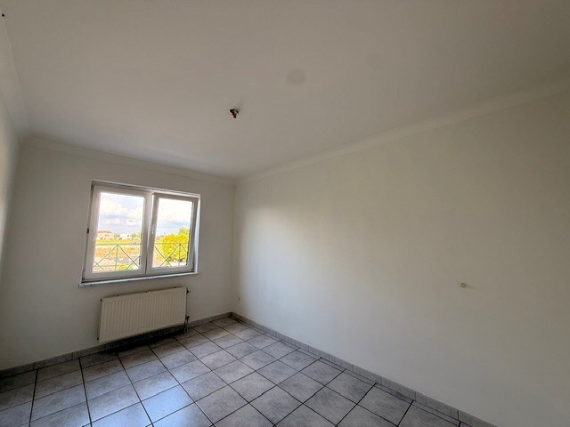 Prachtig appartement met 2 slaapkamers, terras en garage in het centrum van Dilsen 